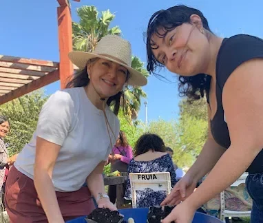 Volunteers At Community Garden Event