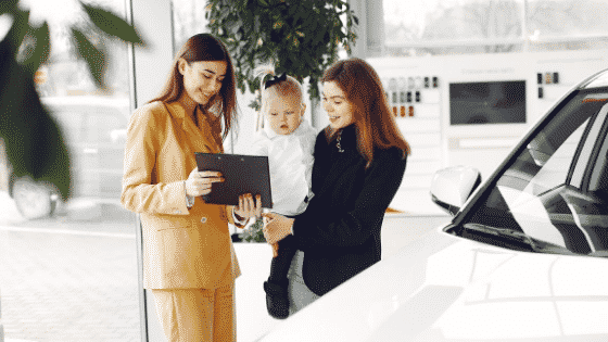 woman at auto dealership